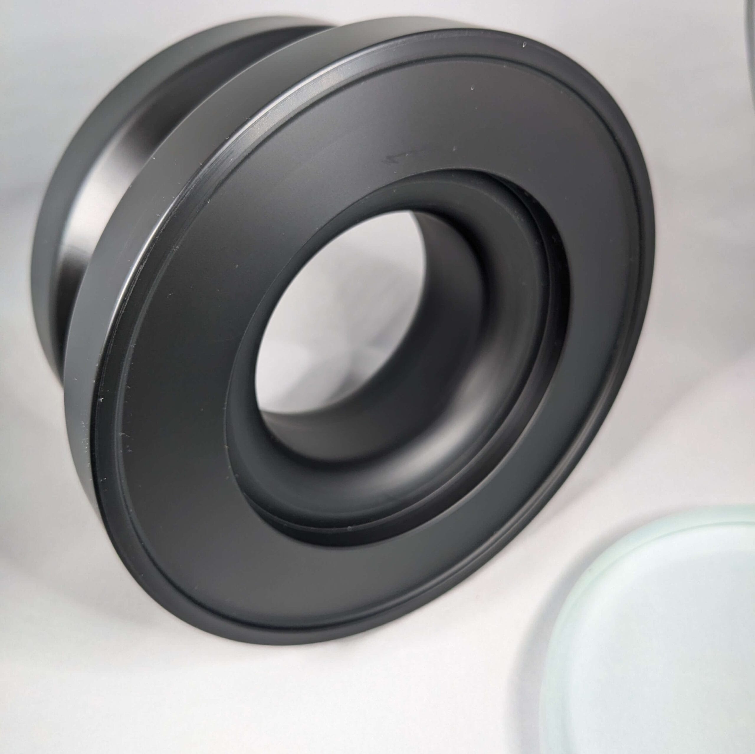 thumbnail interactive-video image 1 of Cool Carry 3.54"Spinning Top Base Rounded By Silicone, Helps 1 of 9